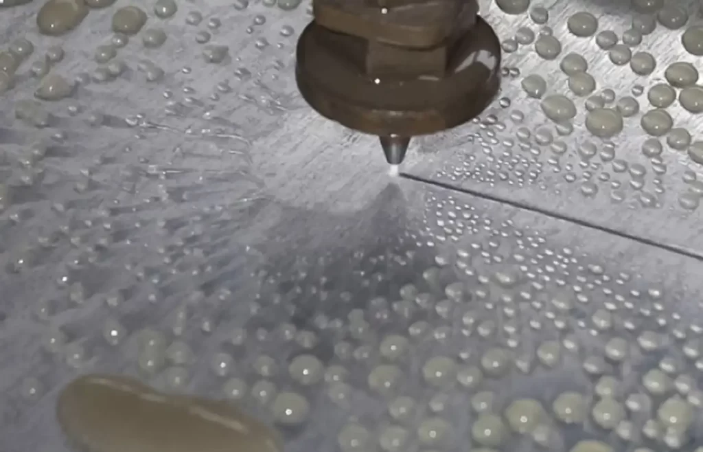 Microwaterjet® Cutting vs. Conventional Waterjet Cutting